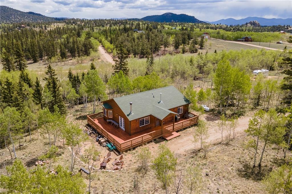 95 Ute Way Como, CO 80432 - Photo 23 of 27 a view of a lake with a mountain in the background