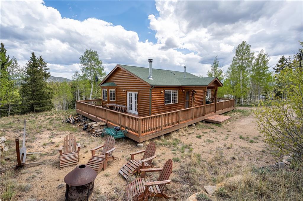 95 Ute Way Como, CO 80432 - Photo 25 of 27 a view of a small yard with wooden fence