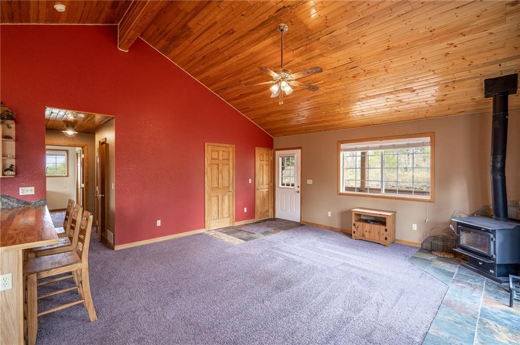 95 Ute Way Como, CO 80432 - Photo 7 of 27 a view of livingroom with furniture and windows