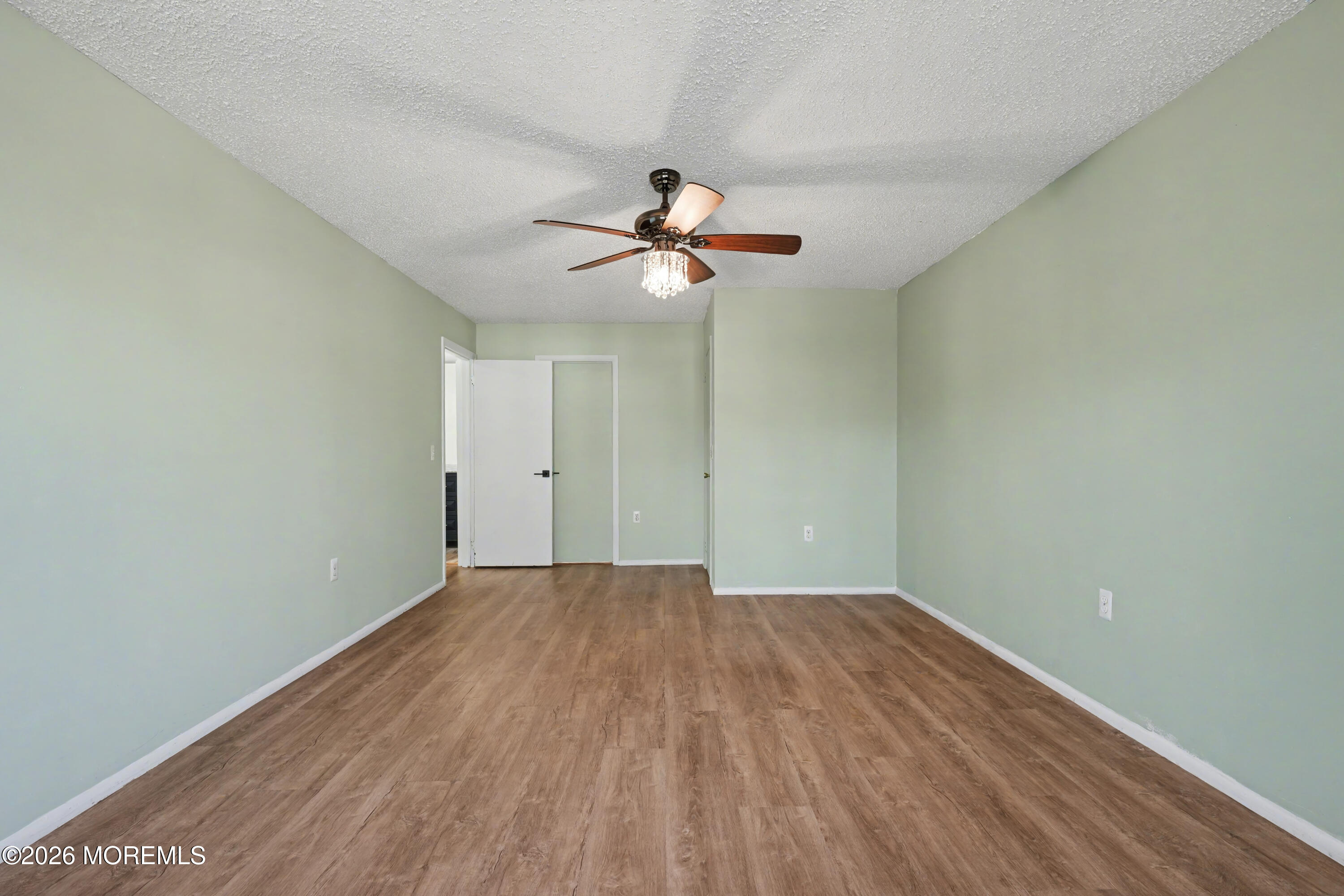 1807 Lilly Lane Jackson, NJ 08527 - Photo 17 of 31 wooden floor in an empty room