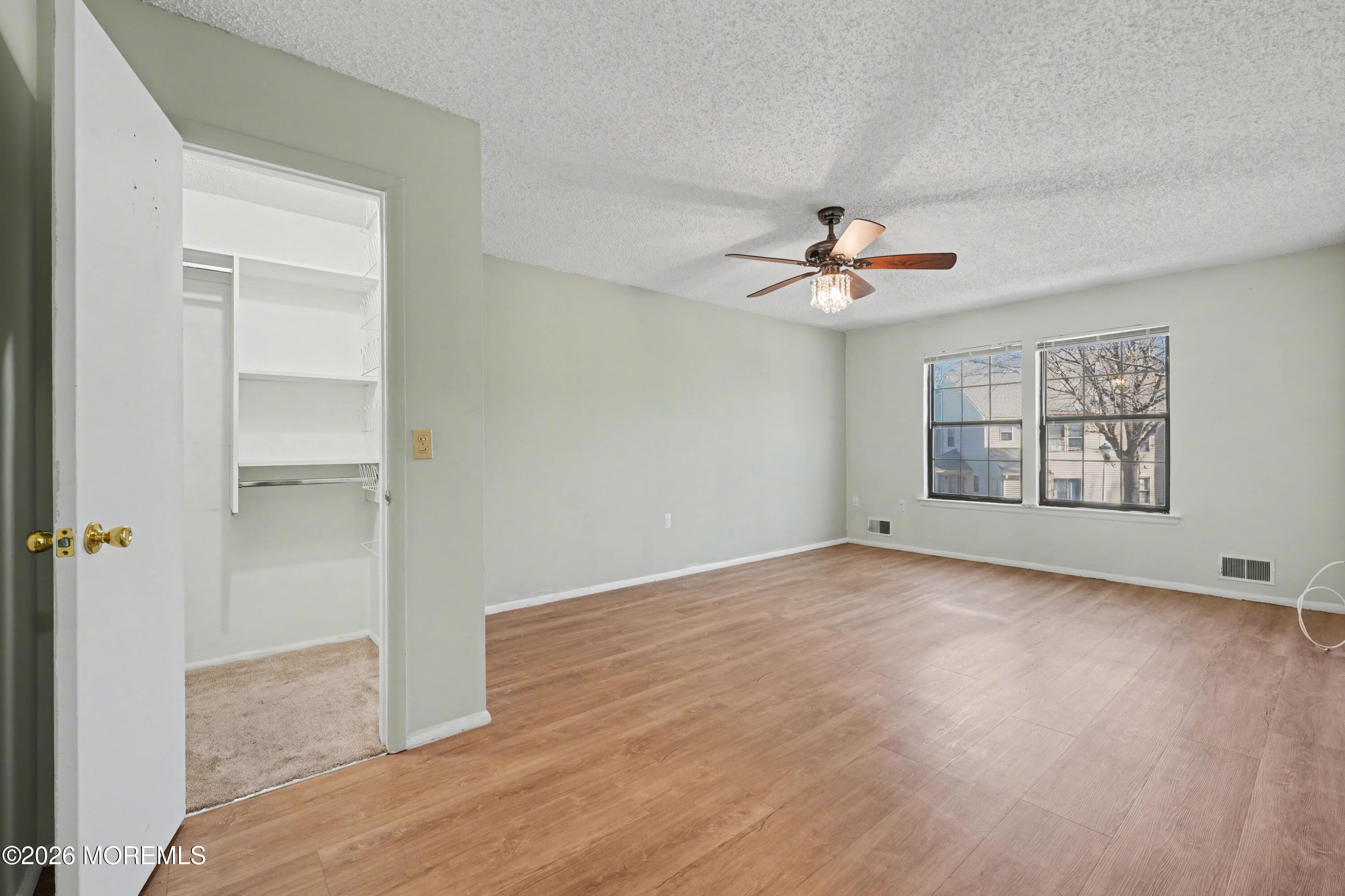 1807 Lilly Lane Jackson, NJ 08527 - Photo 18 of 31 wooden floor in an empty room with a window