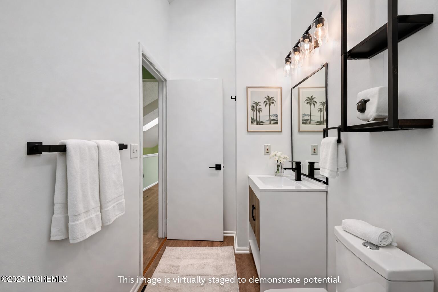 1807 Lilly Lane Jackson, NJ 08527 - Photo 19 of 31 a bathroom with a sink a toilet and shower