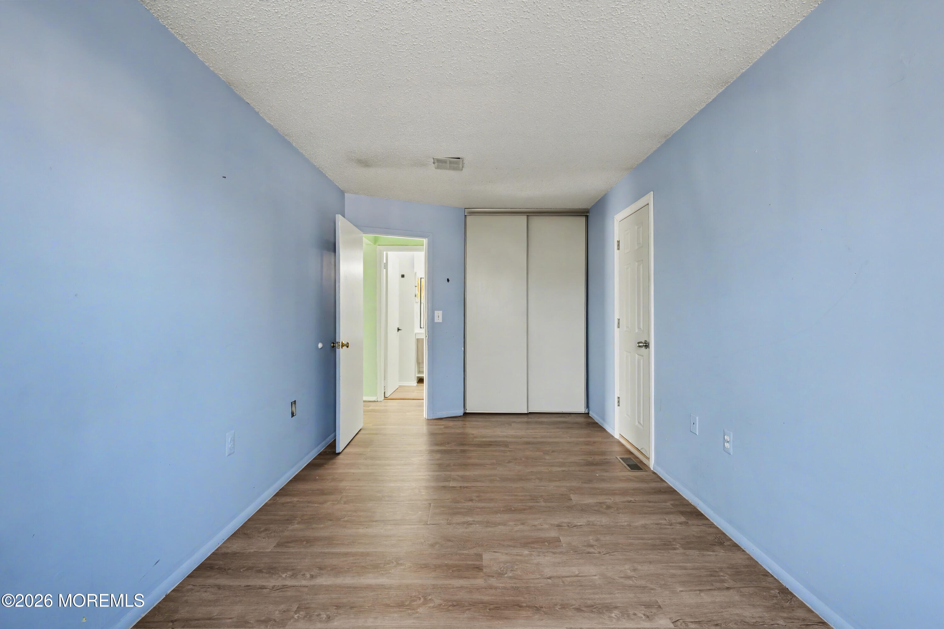 1807 Lilly Lane Jackson, NJ 08527 - Photo 22 of 31 a view of hallway with wooden floor
