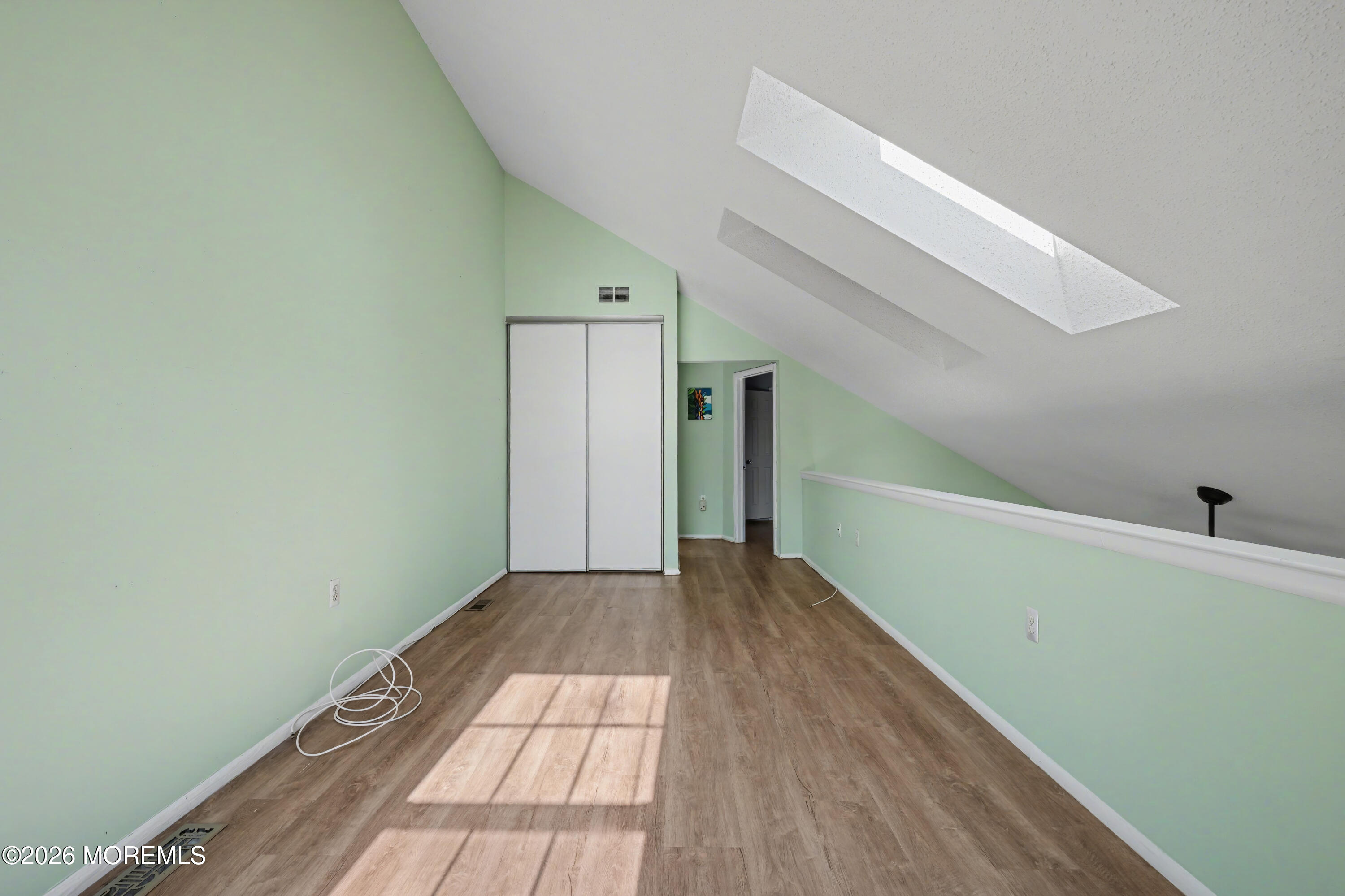 1807 Lilly Lane Jackson, NJ 08527 - Photo 25 of 31 a view of a hallway with wooden floor