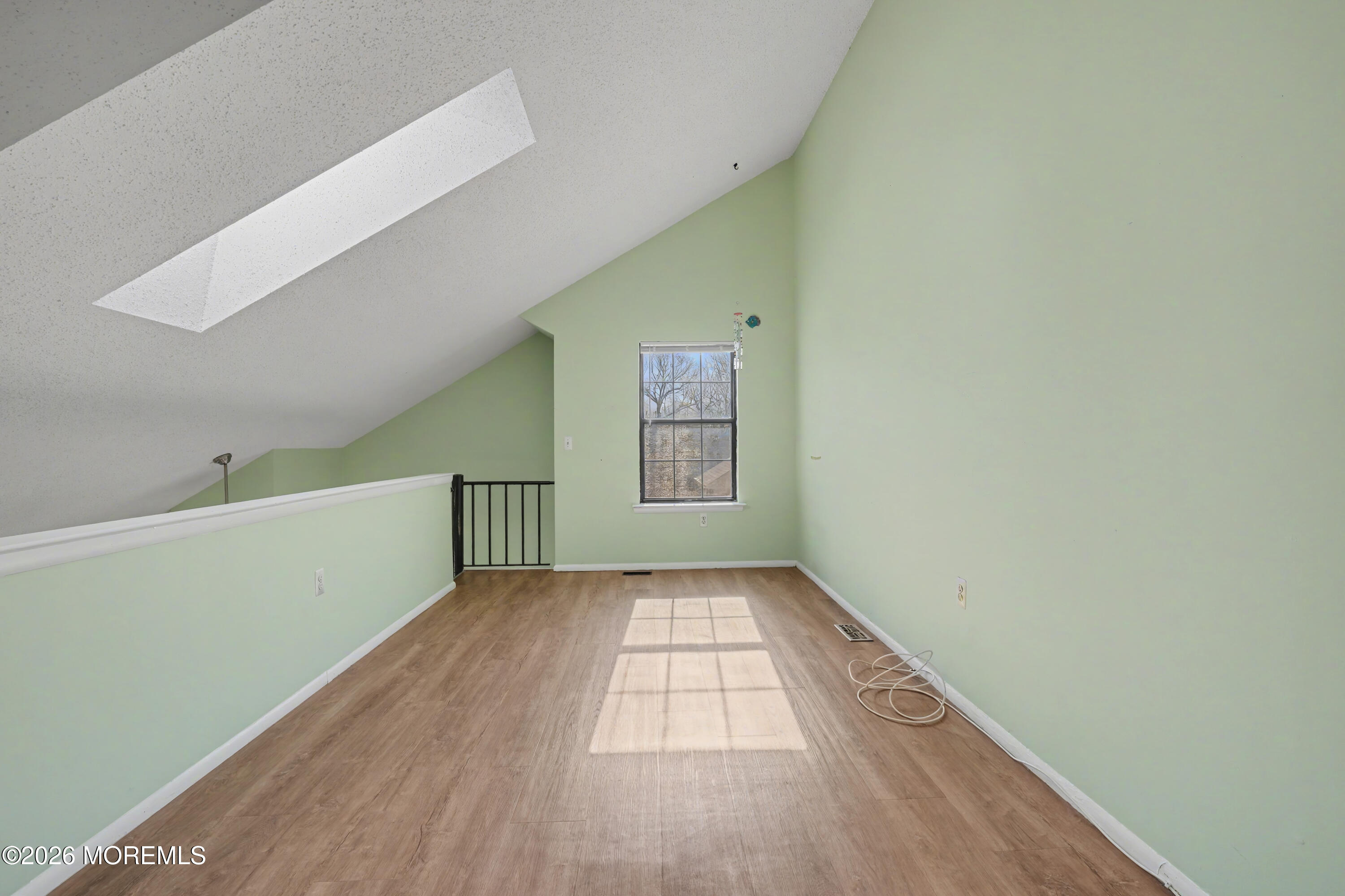 1807 Lilly Lane Jackson, NJ 08527 - Photo 26 of 31 a view of an empty room with window and stairs