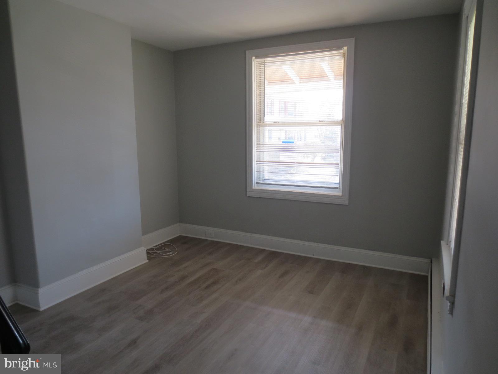 617 Benson Street Philadelphia, PA 19111 - Photo 17 of 37 an empty room with a window