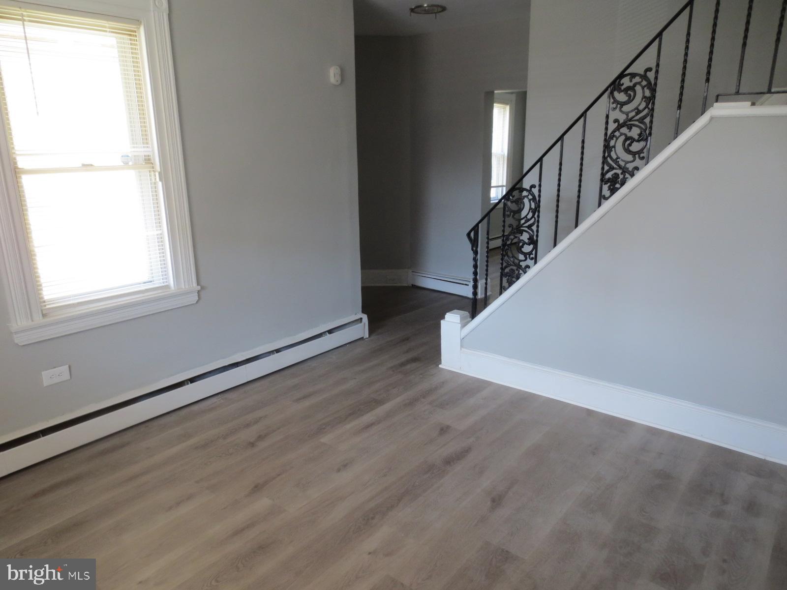 617 Benson Street Philadelphia, PA 19111 - Photo 19 of 37 a view of entryway and hall with wooden floor