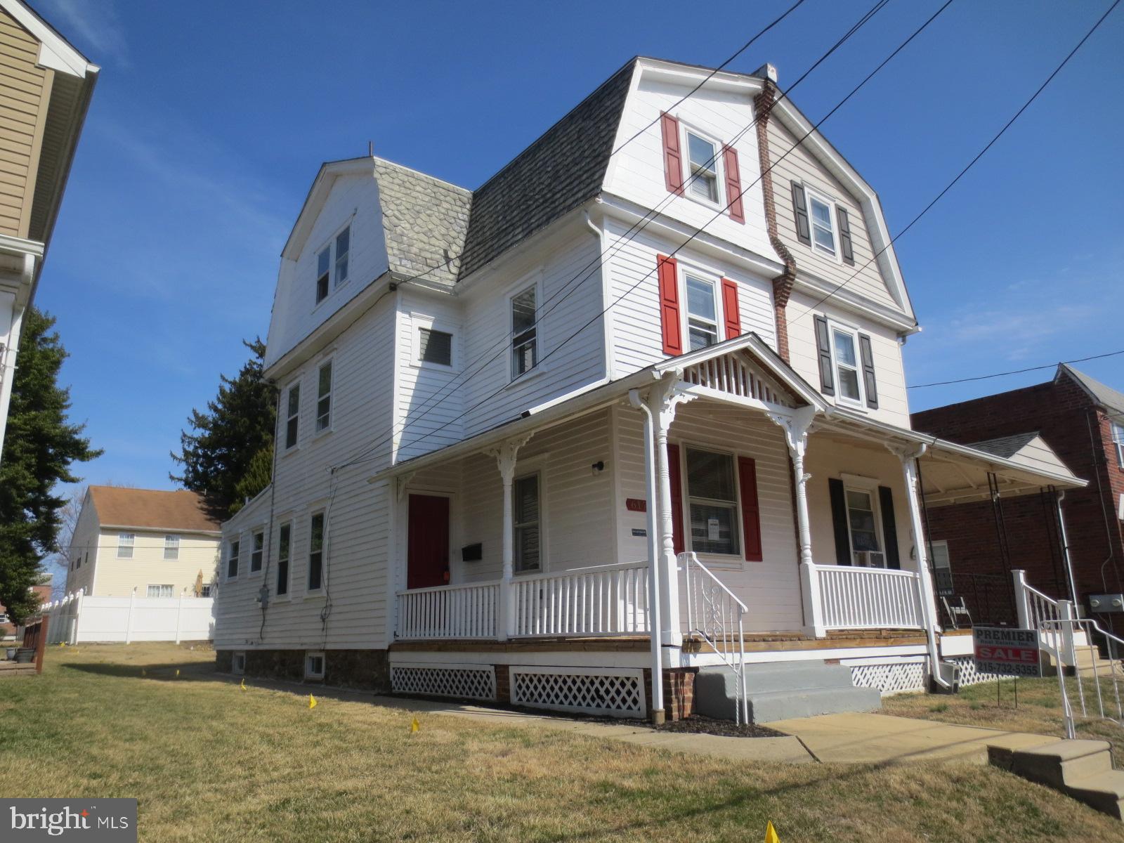 617 Benson Street Philadelphia, PA 19111 - Photo 2 of 37 a front view of a house with a yard