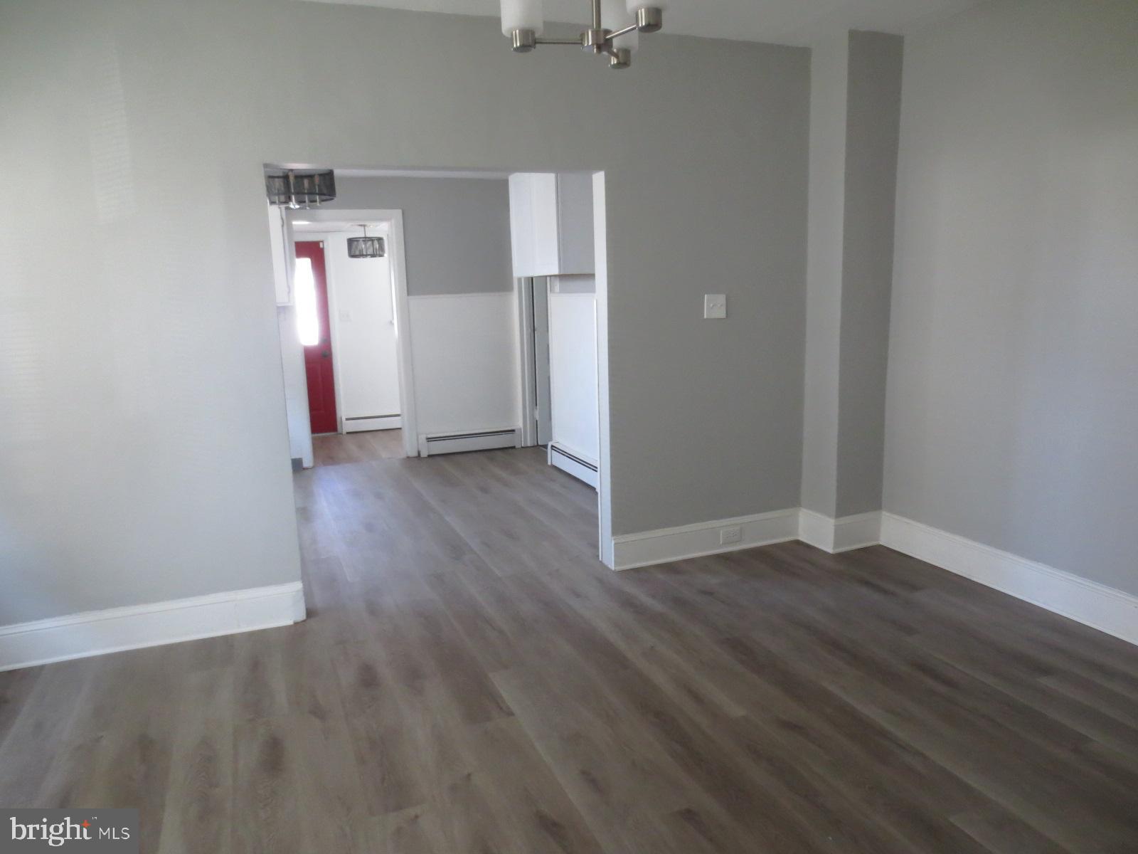 617 Benson Street Philadelphia, PA 19111 - Photo 36 of 37 an empty room with wooden floor & windows