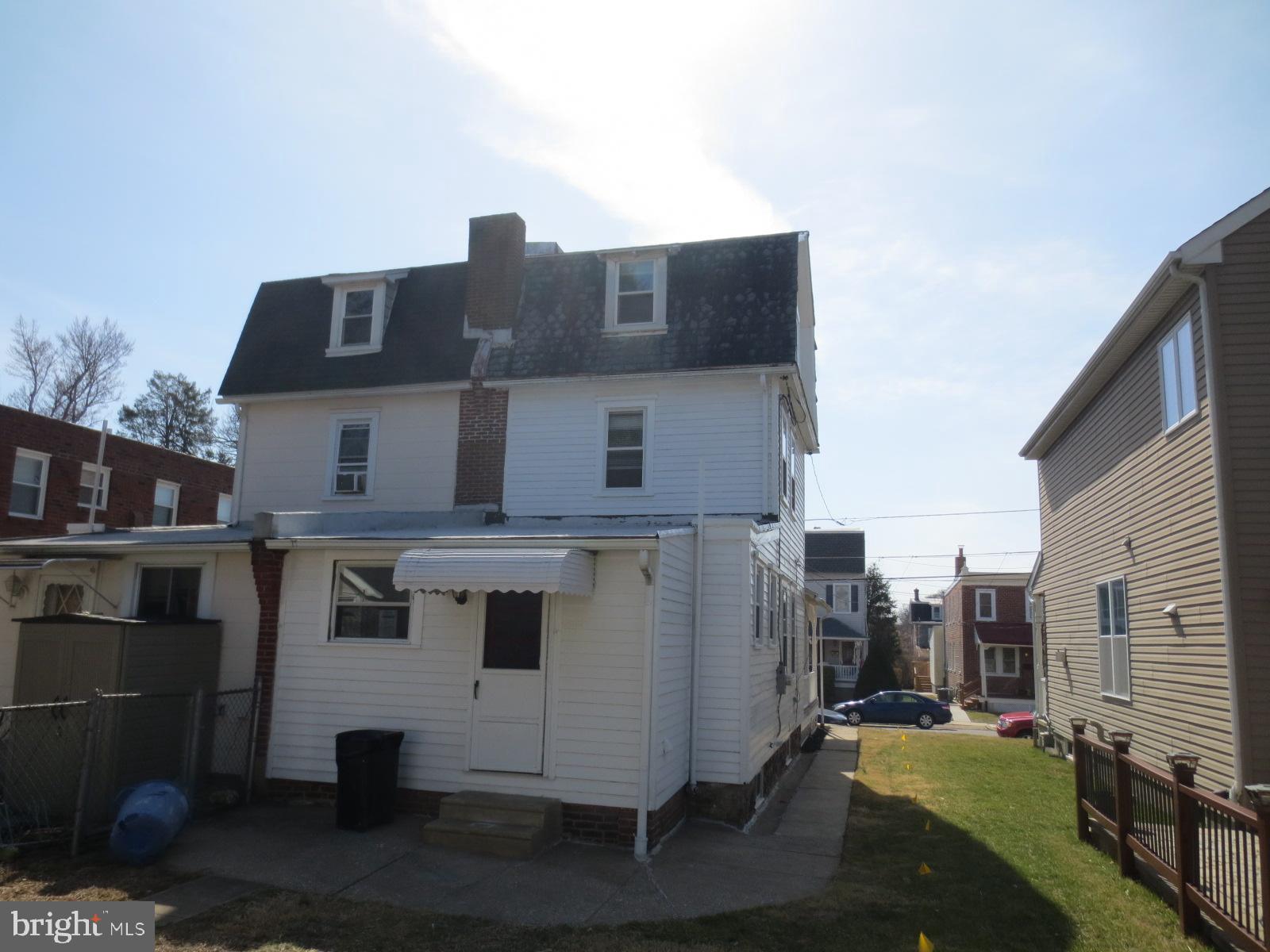 617 Benson Street Philadelphia, PA 19111 - Photo 8 of 37 a front view of a house with a yard