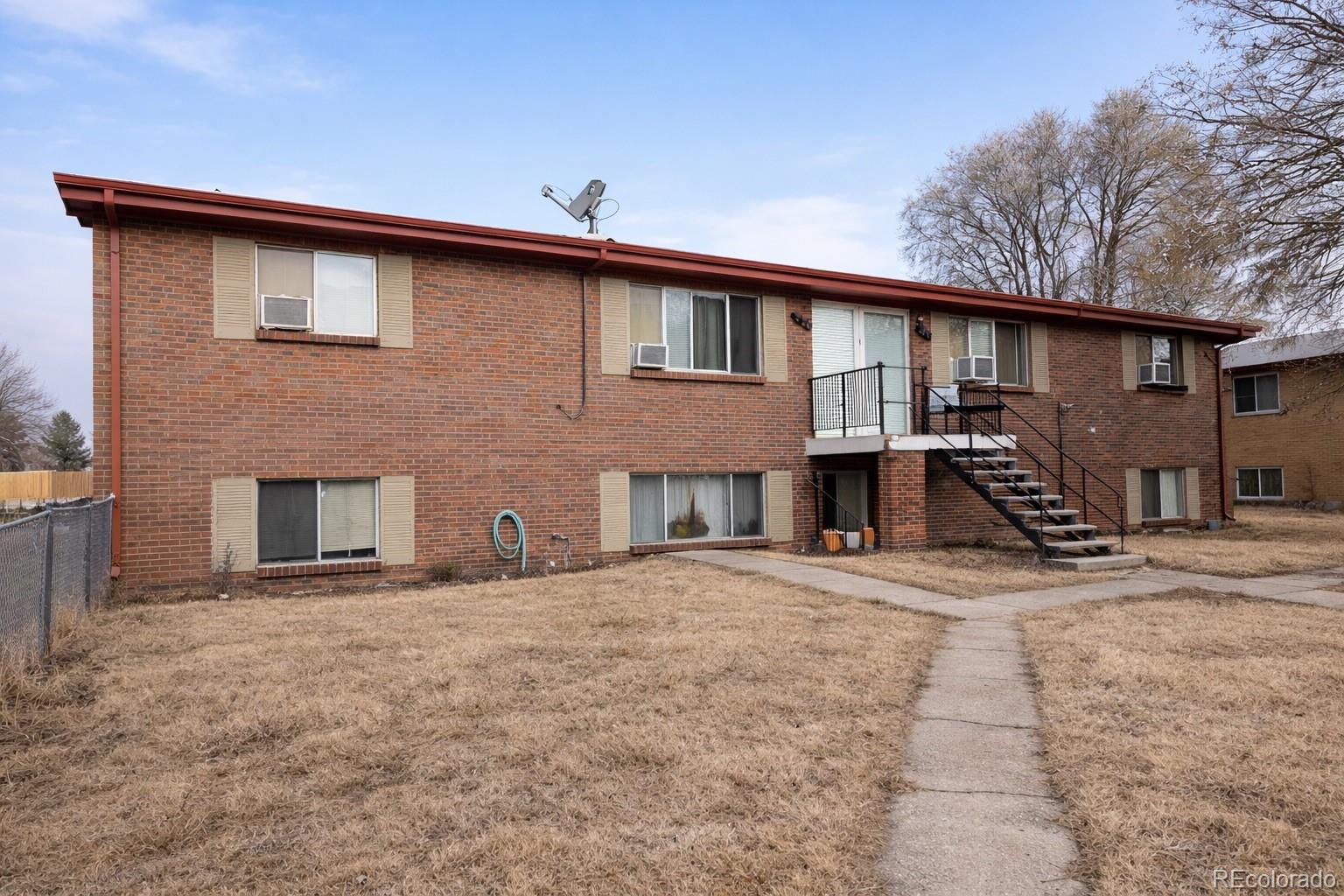 a front view of a house with garage