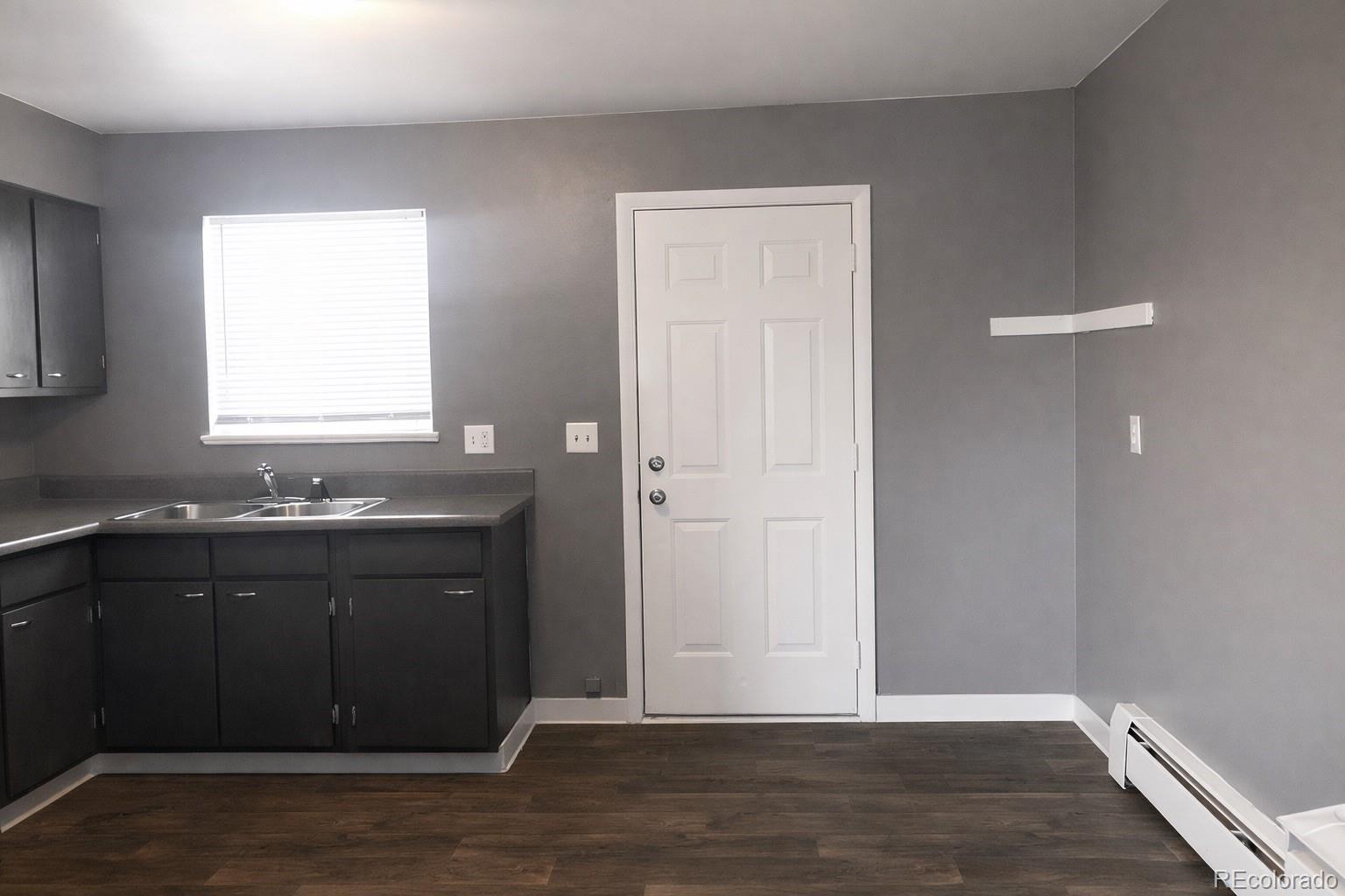 7155 Stuart Street Westminster, CO 80030 - Photo 3 of 11 a view of a sink and a window