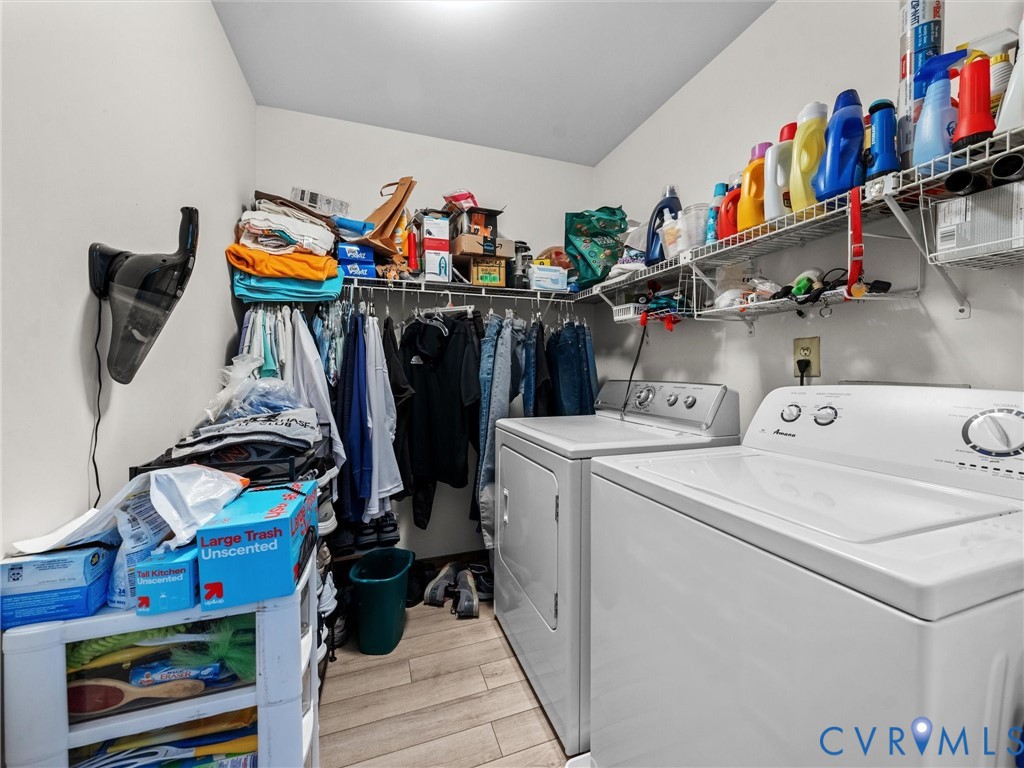 7706 Northern Dancer Court Midlothian, VA 23112 - Photo 30 of 40 a utility room with dryer and washer