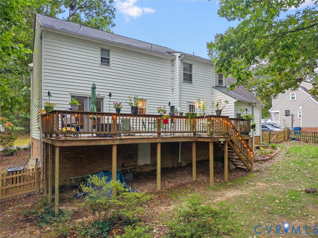 7706 Northern Dancer Court Midlothian, VA 23112 - Photo 3 of 40 a view of a house with a chairs and table in a patio