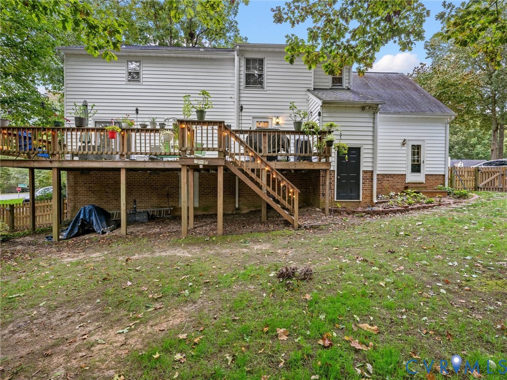 7706 Northern Dancer Court Midlothian, VA 23112 - Photo 33 of 40 a view of a house with a yard and sitting area
