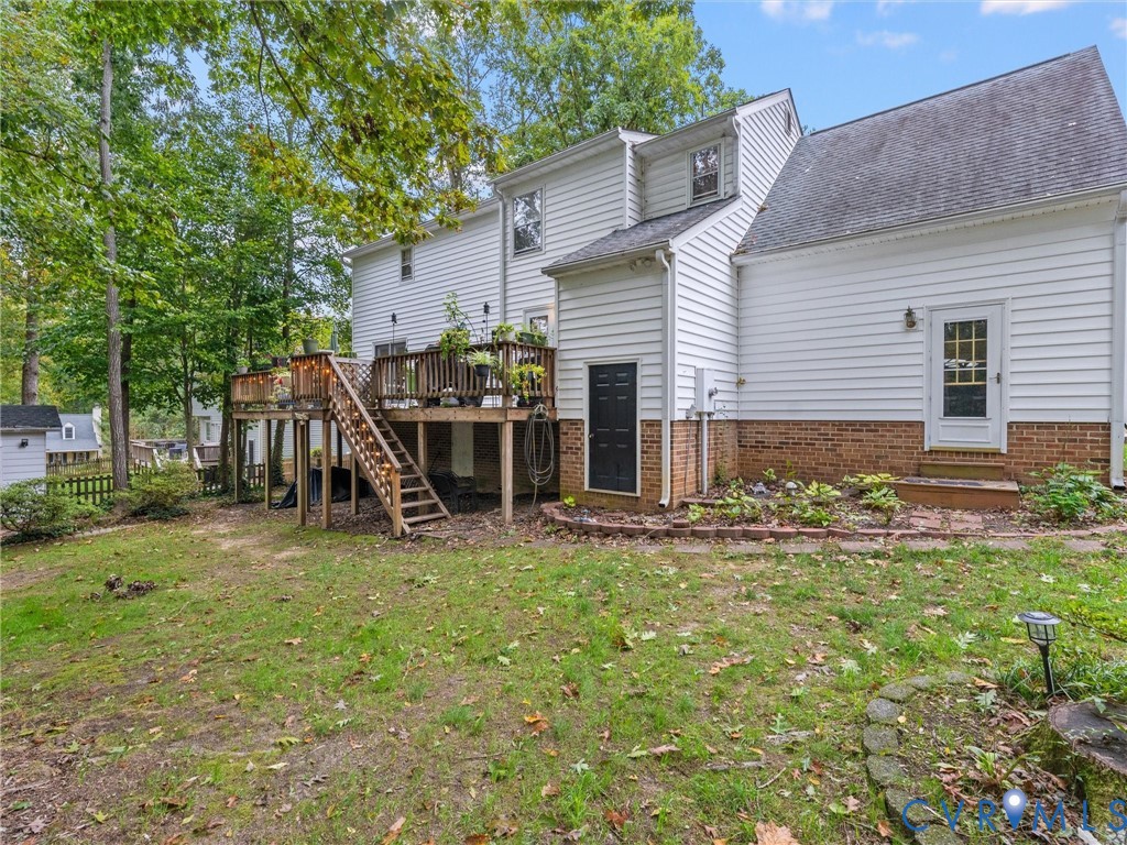 7706 Northern Dancer Court Midlothian, VA 23112 - Photo 34 of 40 a view of a house with backyard