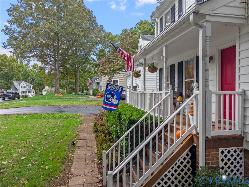7706 Northern Dancer Court Midlothian, VA 23112 - Photo 38 of 40 a view of a house with a yard and a deck
