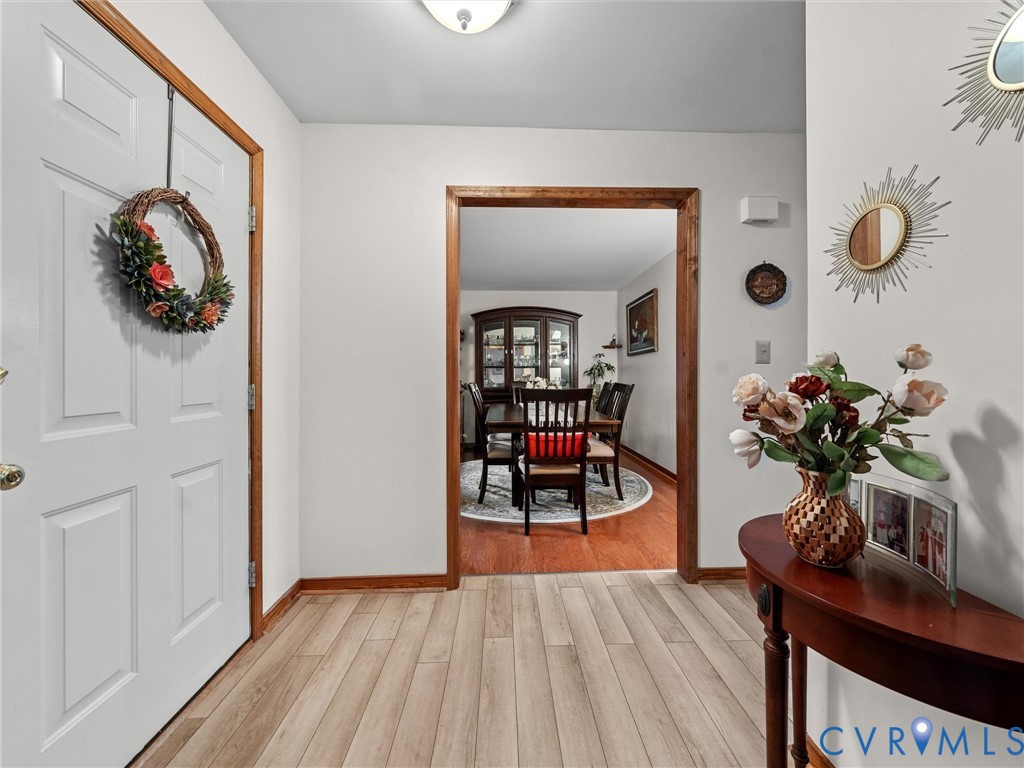 7706 Northern Dancer Court Midlothian, VA 23112 - Photo 4 of 40 a living room with furniture and wooden floor