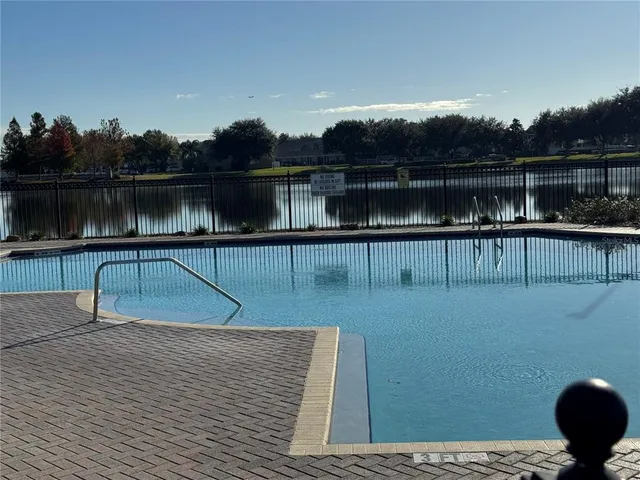 a view of a lake from a balcony