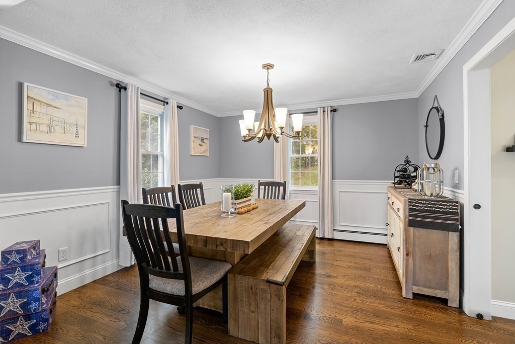 4 Robert Street Walpole, MA 02081 - Photo 11 of 37 a view of a dining room with furniture and wooden floor