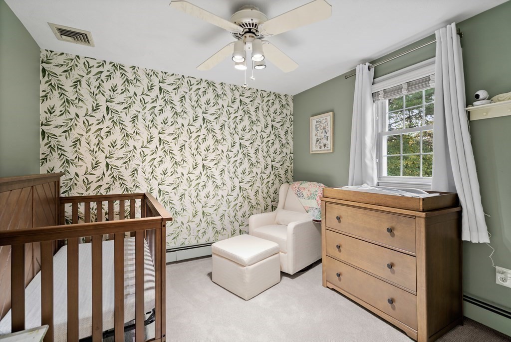 4 Robert Street Walpole, MA 02081 - Photo 21 of 37 a living room with furniture and a window