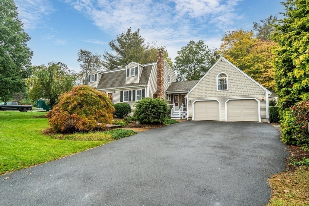 4 Robert Street Walpole, MA 02081 - Photo 35 of 37 a view of a house with a yard and garage