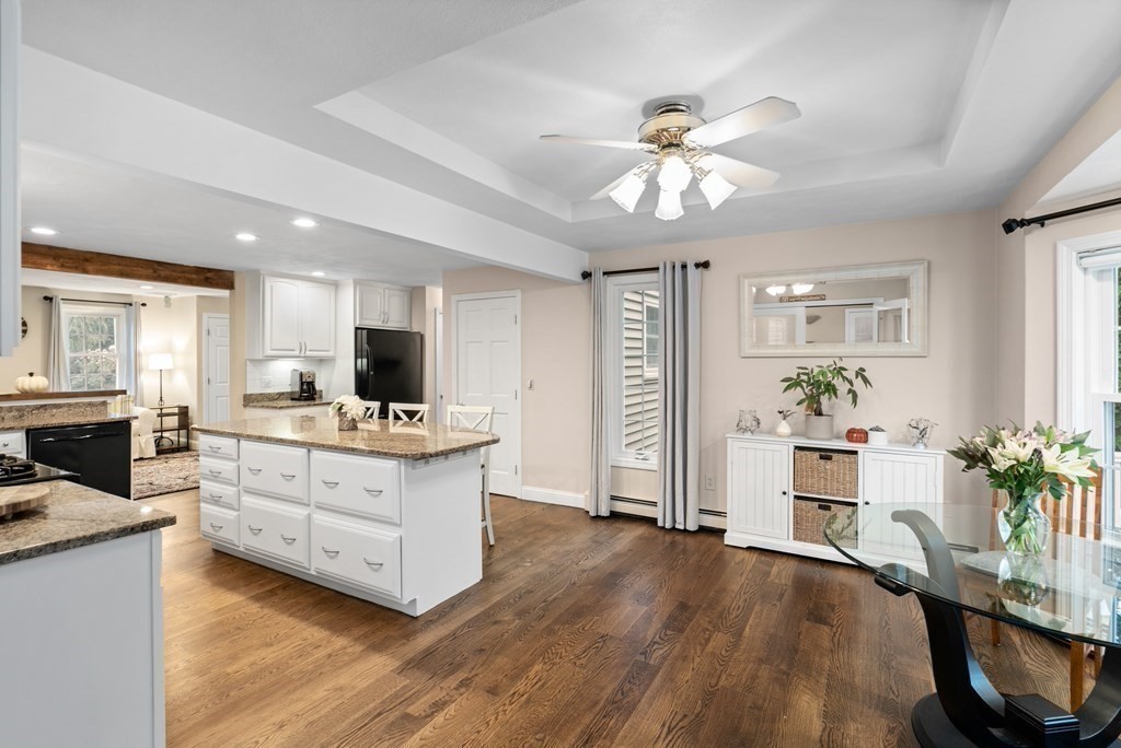 4 Robert Street Walpole, MA 02081 - Photo 4 of 37 a view of kitchen with sink microwave and stove