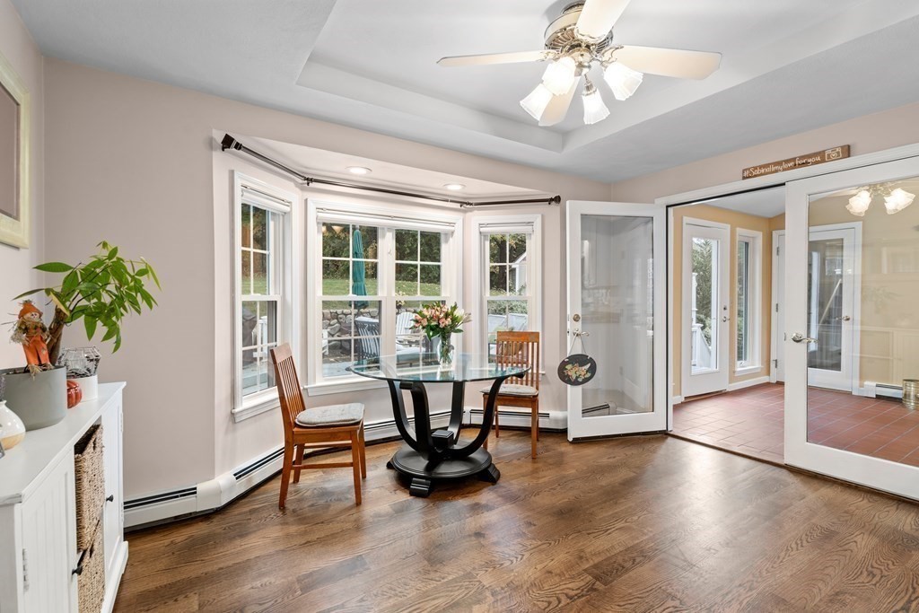 4 Robert Street Walpole, MA 02081 - Photo 6 of 37 a living room with furniture and a potted plant