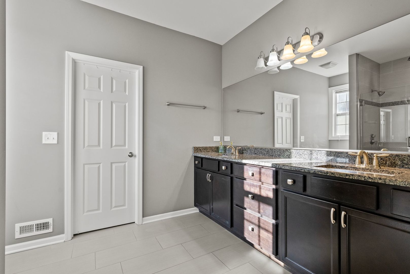 428 East Frontier Drive Minooka, IL 60447 - Photo 18 of 39 a kitchen with a sink and cabinets