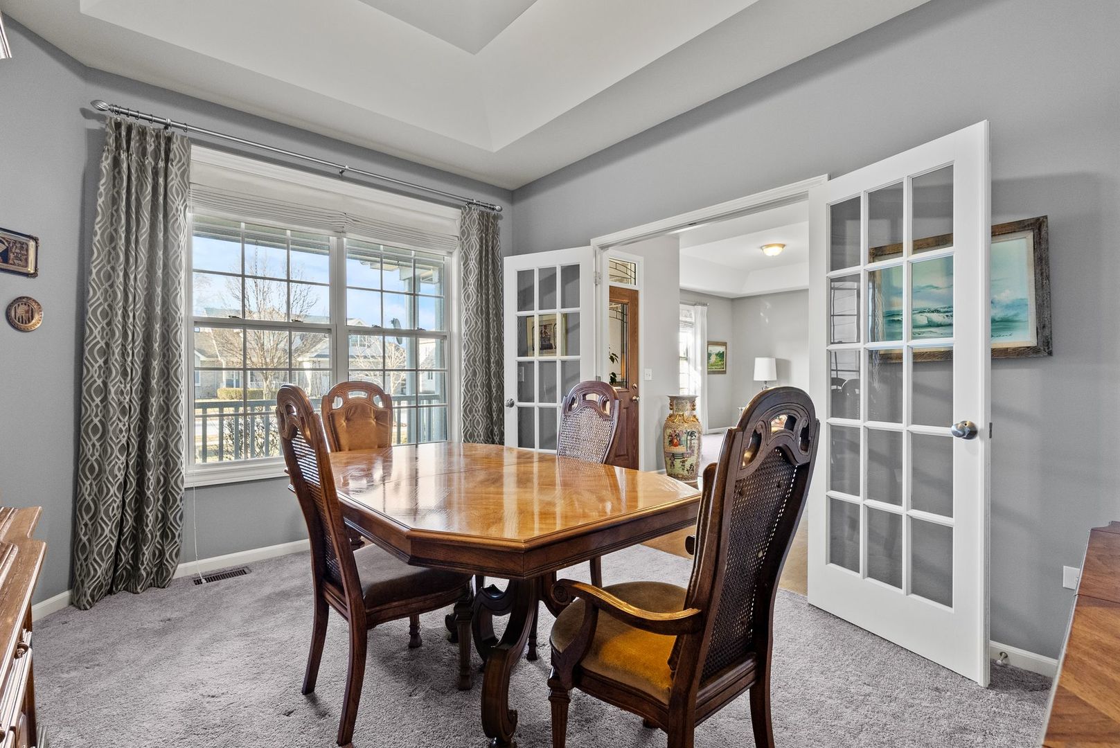 428 East Frontier Drive Minooka, IL 60447 - Photo 22 of 39 a view of a dining room with furniture and wooden floor