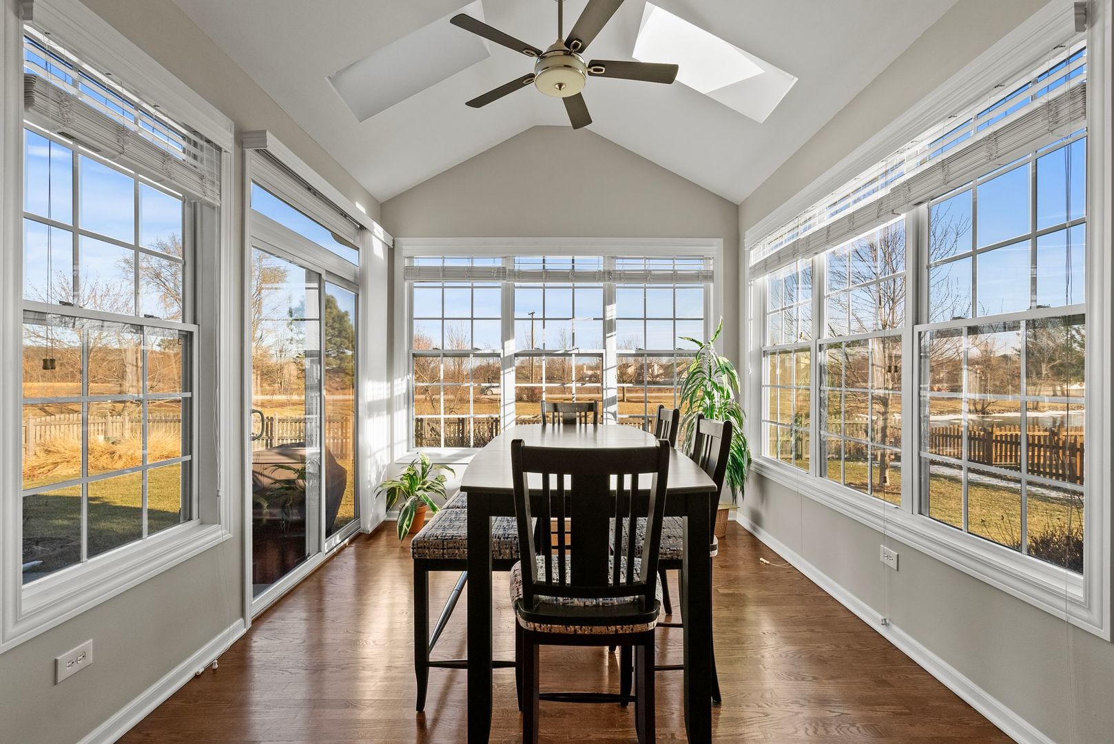 428 East Frontier Drive Minooka, IL 60447 - Photo 6 of 39 a view of a dining room with furniture window and wooden floor