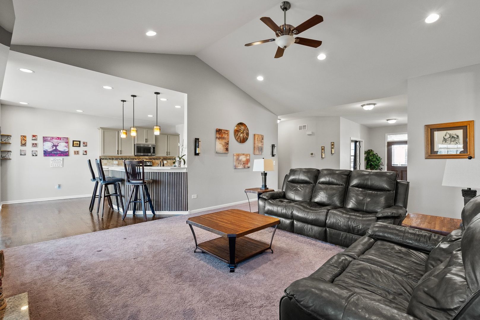 428 East Frontier Drive Minooka, IL 60447 - Photo 9 of 39 a living room with furniture and kitchen view