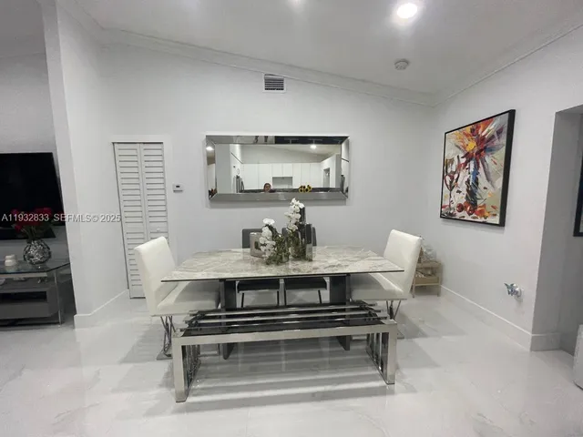 a view of a livingroom with furniture and a couch