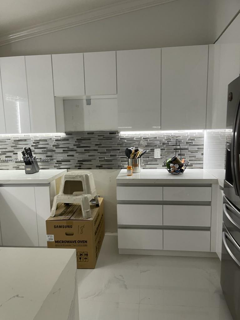 5855 Southwest 128th Court, Unit 5855 Miami, FL 33183 - Photo 7 of 12 a close view of utility room