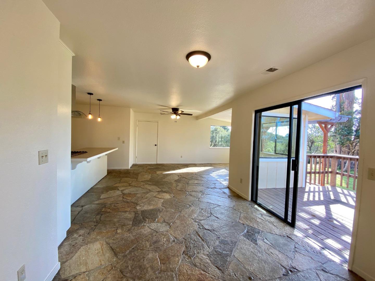 241 Webb Road Watsonville, CA 95076 - Photo 15 of 40 a view of a big room with a large window