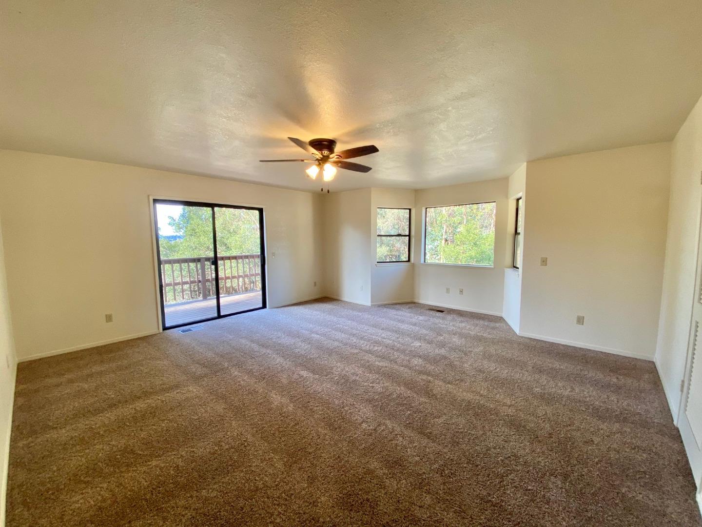 241 Webb Road Watsonville, CA 95076 - Photo 18 of 40 a view of an empty room with a window