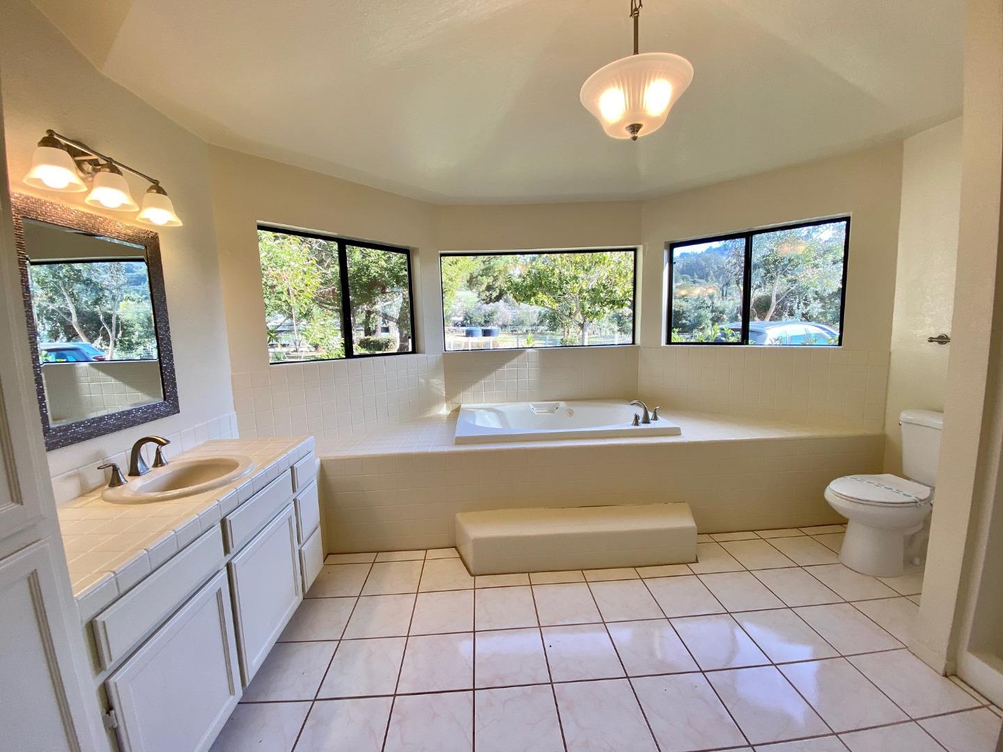 241 Webb Road Watsonville, CA 95076 - Photo 20 of 40 a bathroom with a sink a toilet and a bathtub