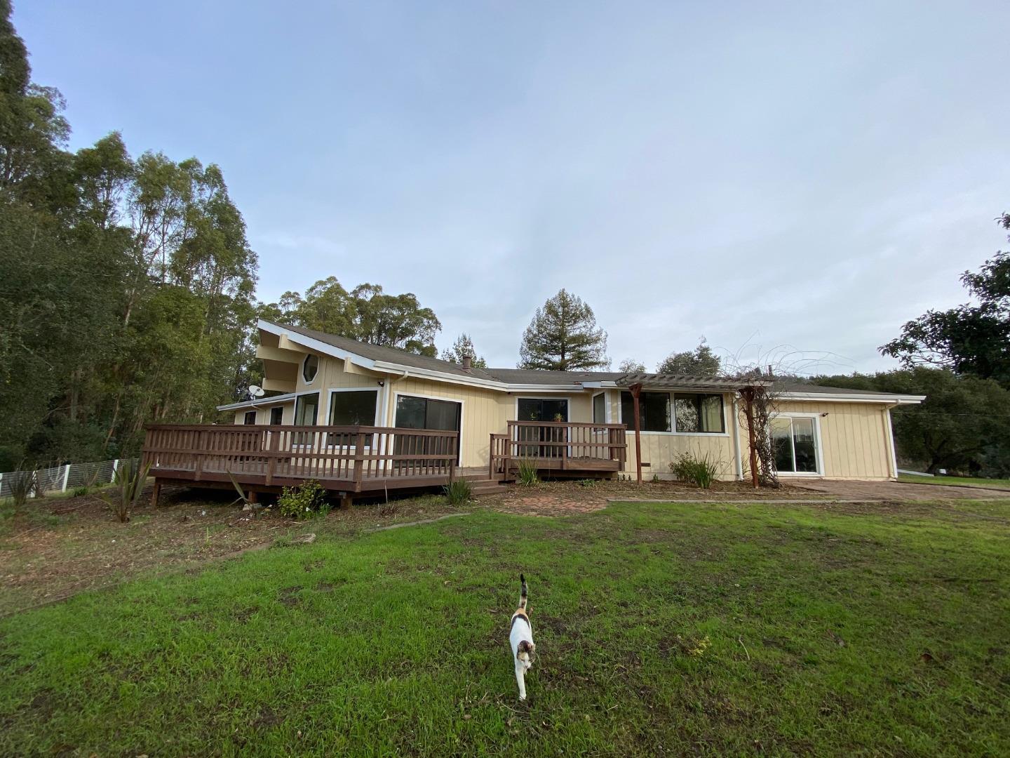 241 Webb Road Watsonville, CA 95076 - Photo 3 of 40 a view of a house with a backyard porch and sitting area
