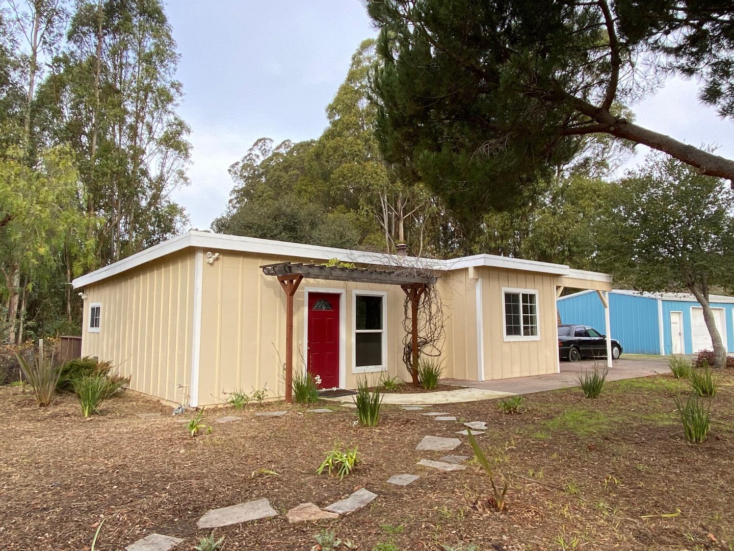 241 Webb Road Watsonville, CA 95076 - Photo 25 of 40 a view of a house with a yard and large tree
