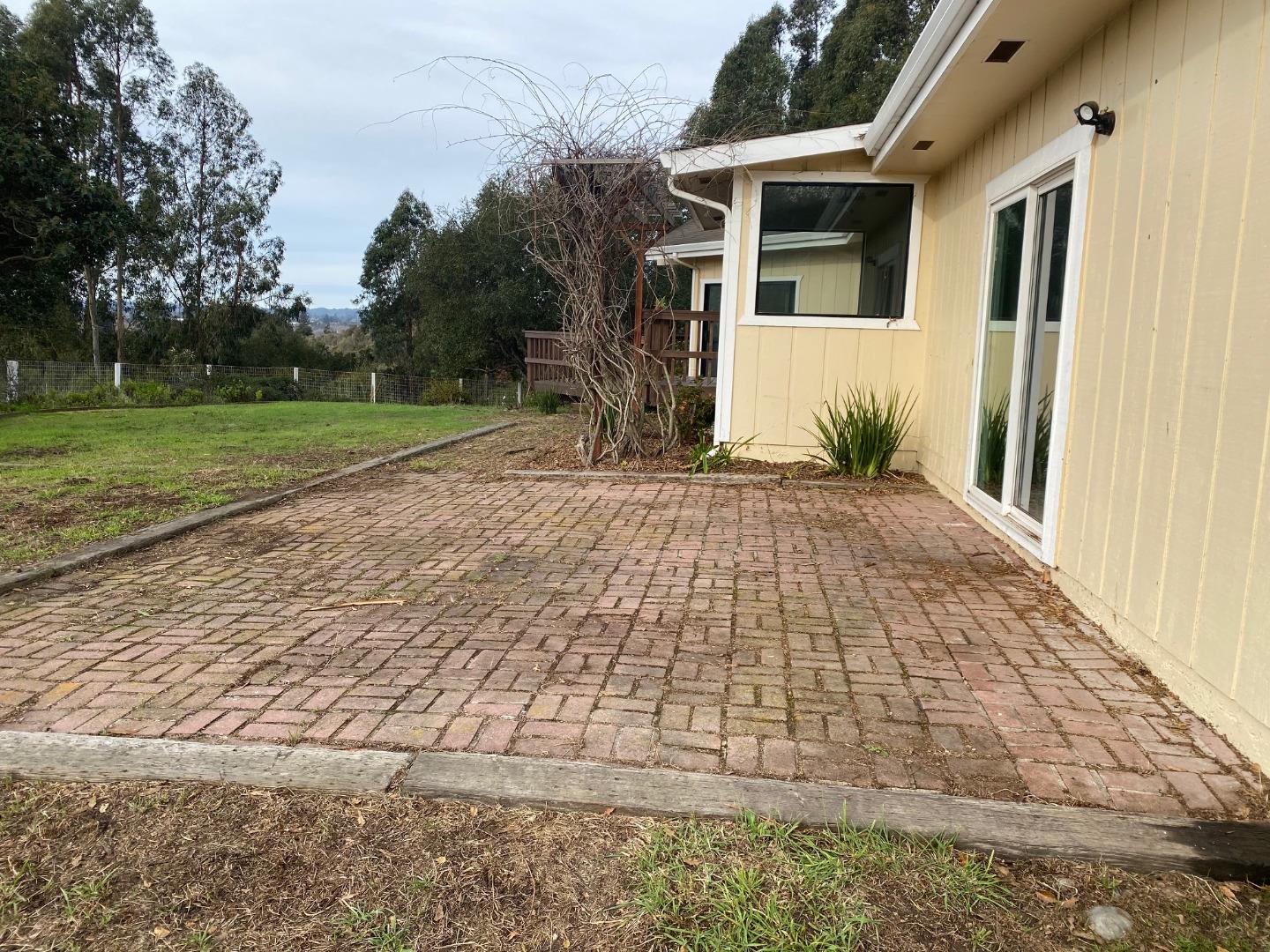 241 Webb Road Watsonville, CA 95076 - Photo 4 of 40 a front view of a house with a yard