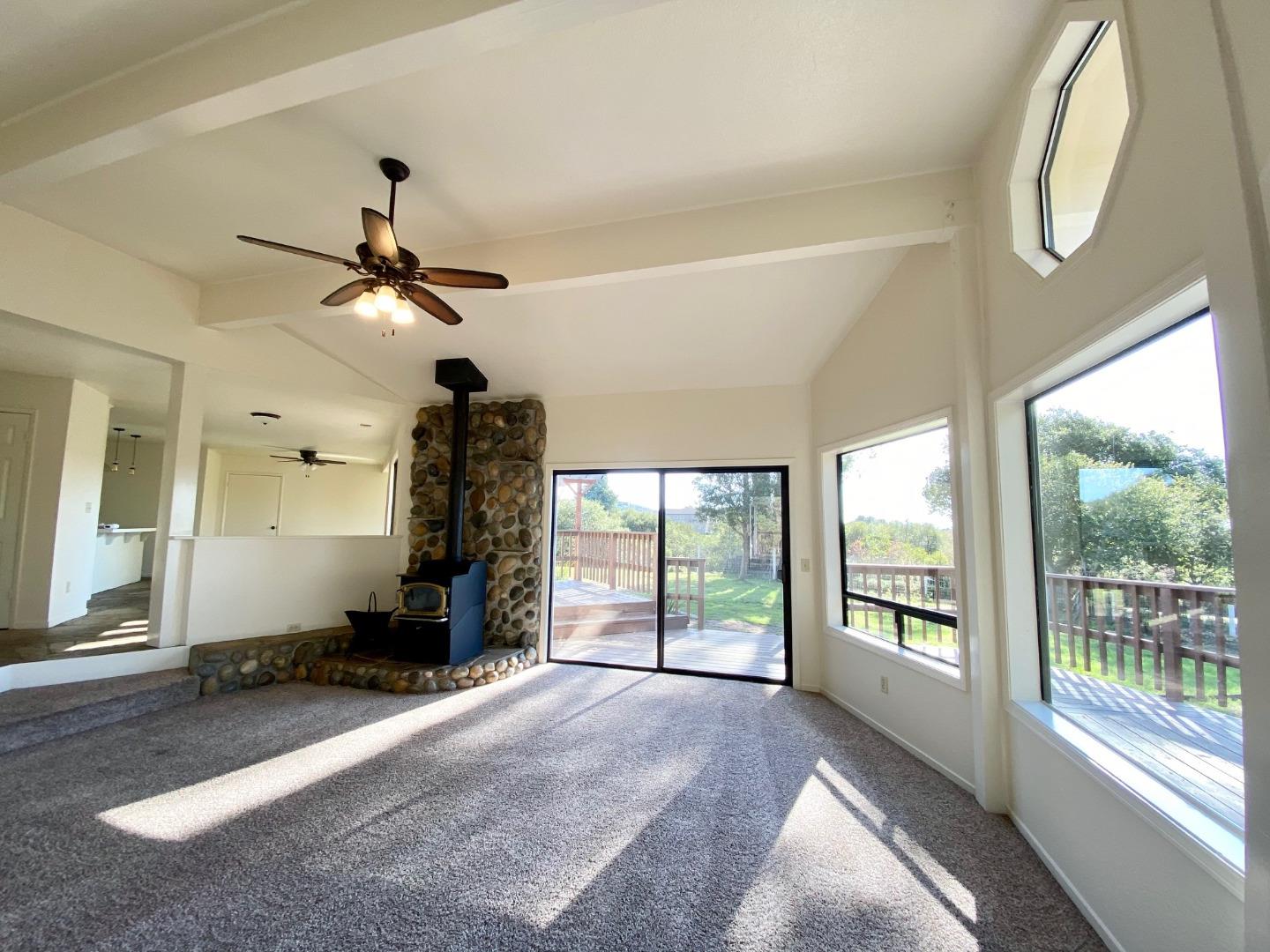 241 Webb Road Watsonville, CA 95076 - Photo 10 of 40 a view of a livingroom with a ceiling fan and window