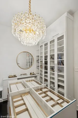 a living room with a piano and a table
