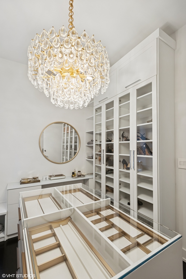 42 East Schiller Street Chicago, IL 60610 - Photo 34 of 50 a living room with a piano and a table