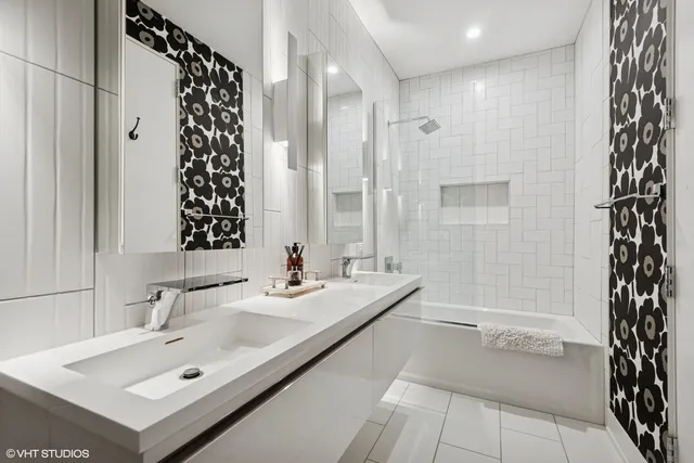 a bathroom with a sink and a bathtub