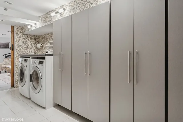 a view of a hallway with washer and dryer