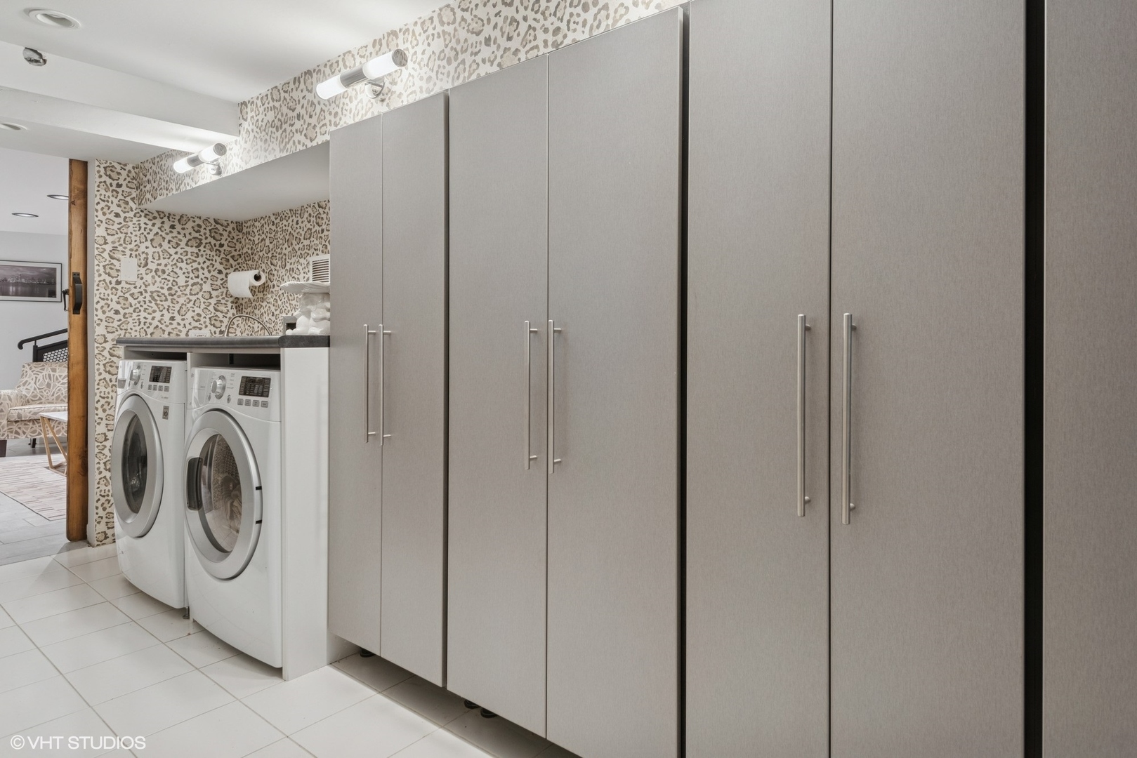 42 East Schiller Street Chicago, IL 60610 - Photo 41 of 50 a view of a hallway with washer and dryer