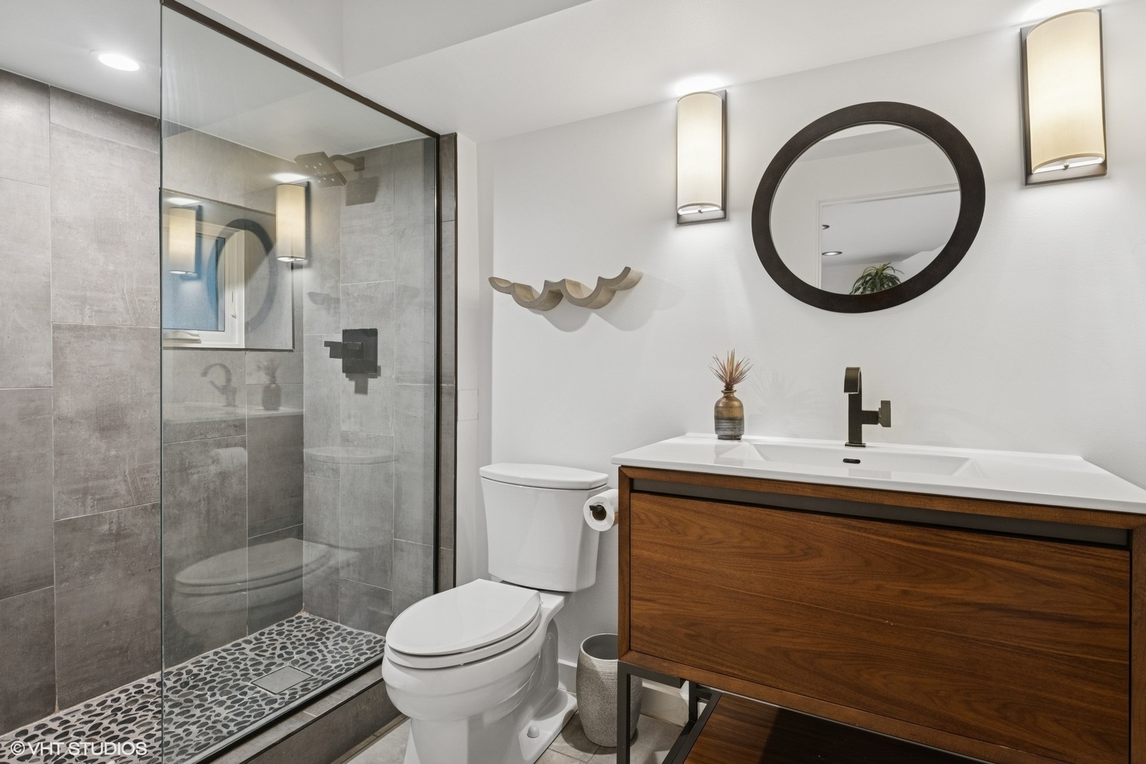 42 East Schiller Street Chicago, IL 60610 - Photo 44 of 50 a bathroom with a sink toilet and shower