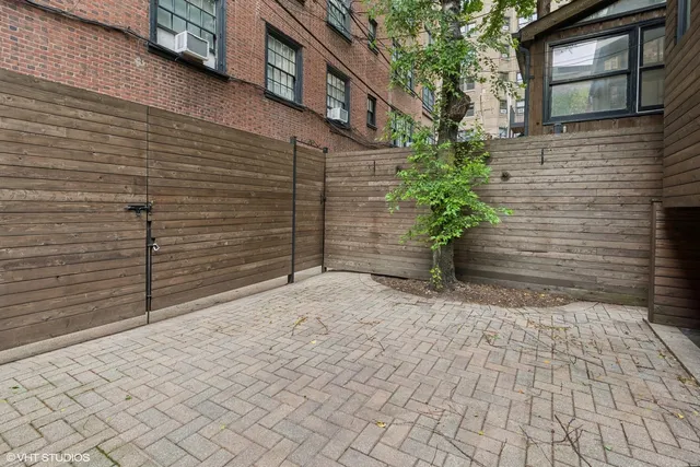 a view of a pathway along the building