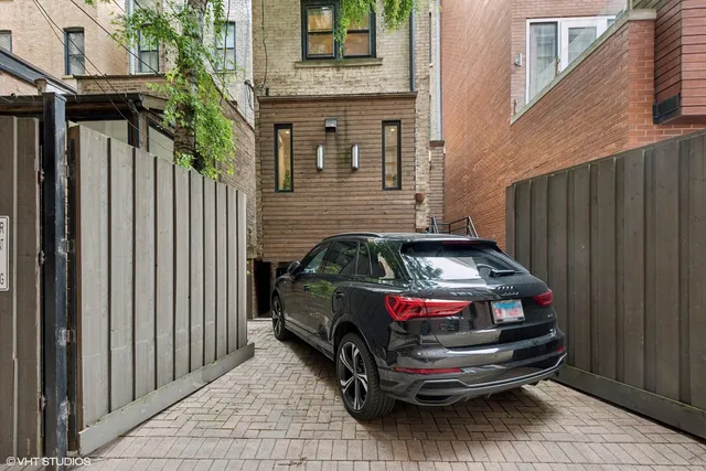 a car parked in front of a house