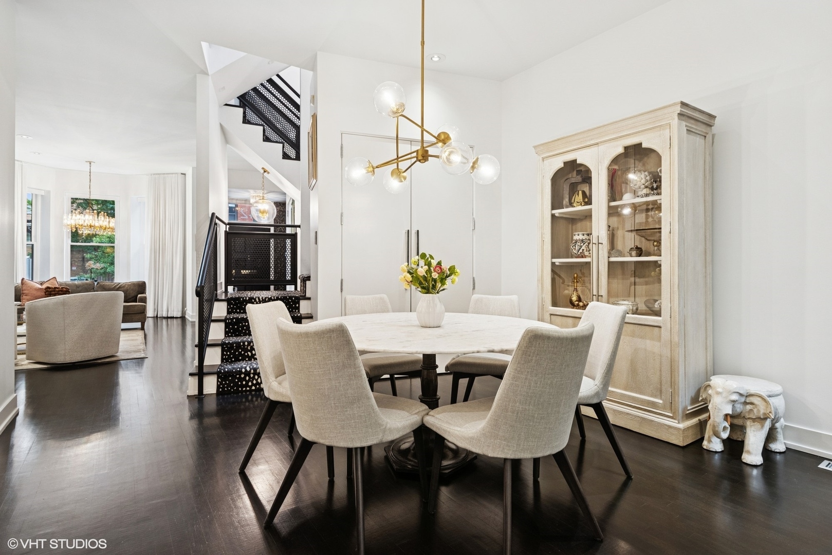 42 East Schiller Street Chicago, IL 60610 - Photo 8 of 50 a view of a dining room with furniture window and wooden floor